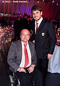 Junto a Giancarlo Fisichella, durante la cena de gala organizada durante las Finales Mundiales Ferrari 2012, celebradas en Valencia